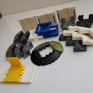 LEGO Assorted Building Pieces in Blue, Yellow, and Black